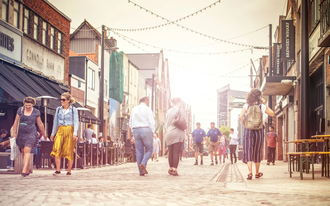 People walking down Humber Street in Hull