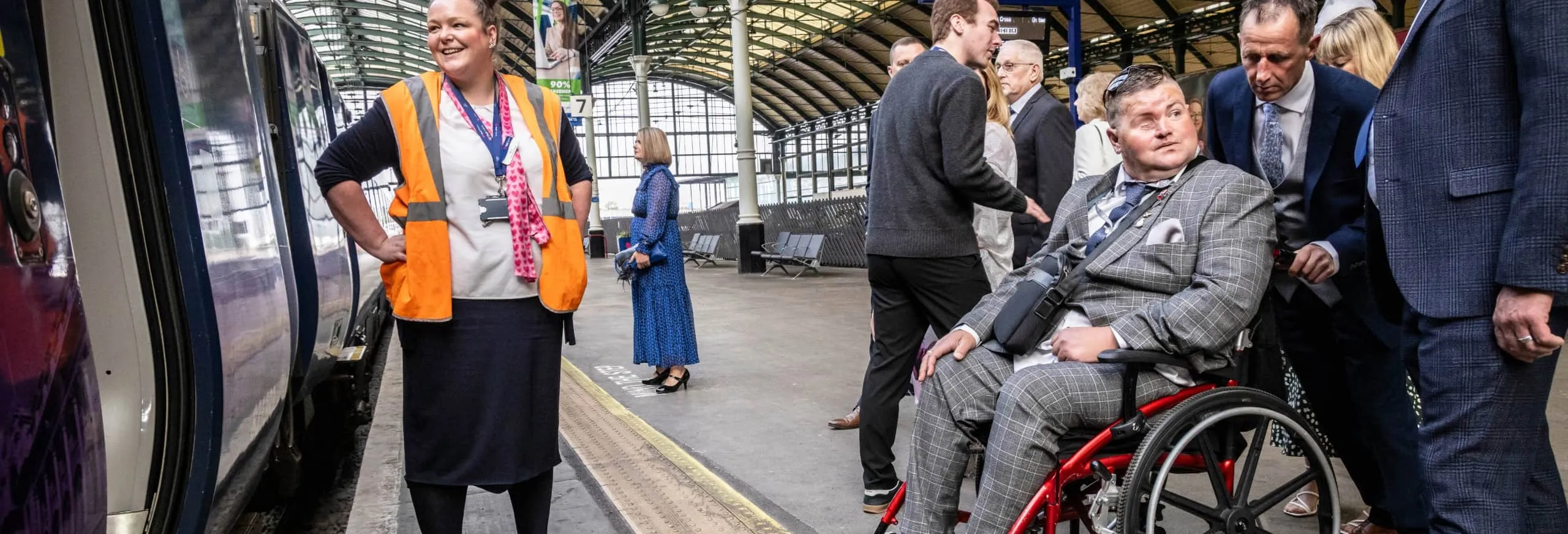 Hull4Heroes boarding a Hull Trains service with a member of the onboard crew