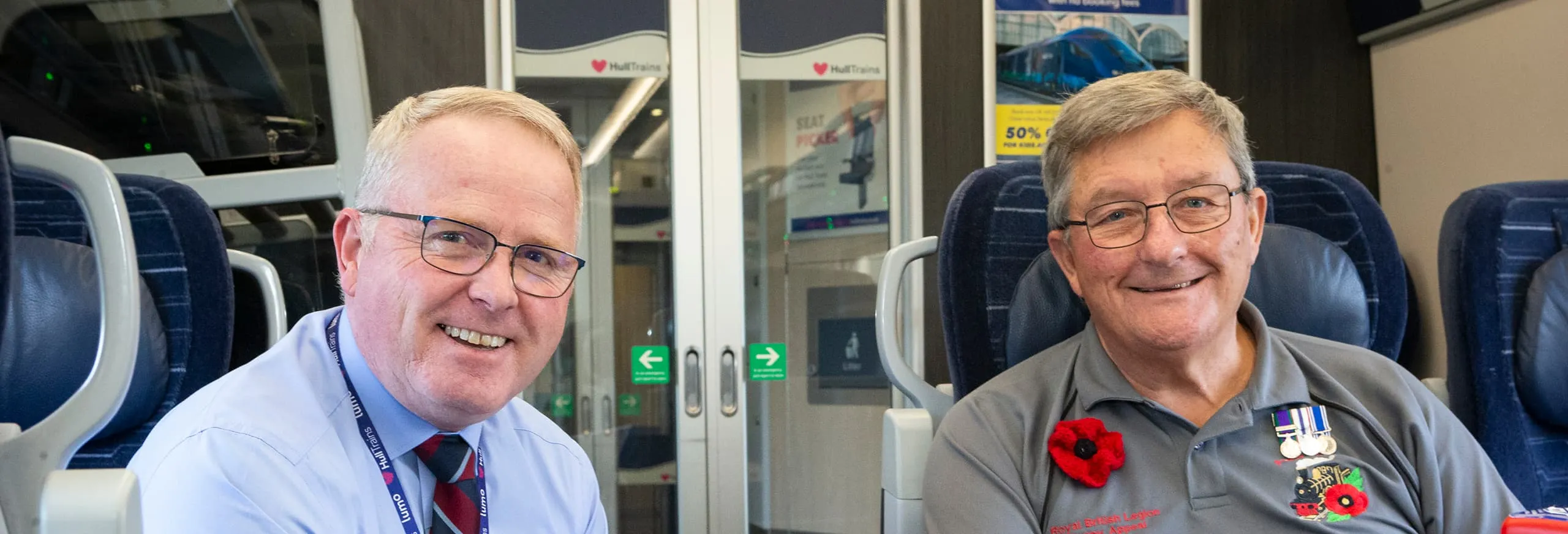 A photo of two men onboard a Hull Trains service