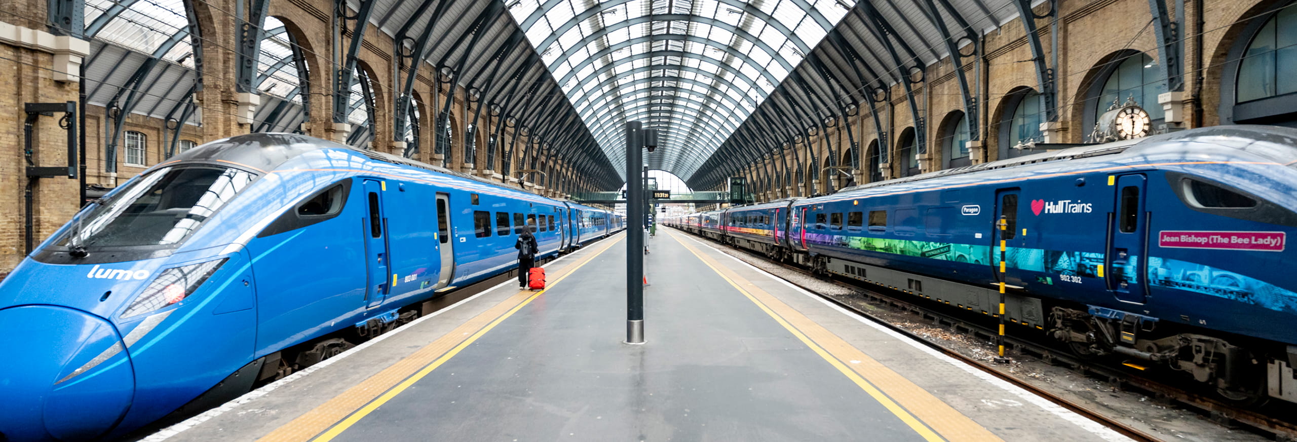 A photo of a Lumo train and Hull Trains service at London Kings Cross station