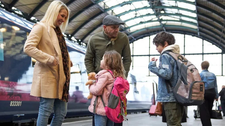 family on platform at hull paragon station