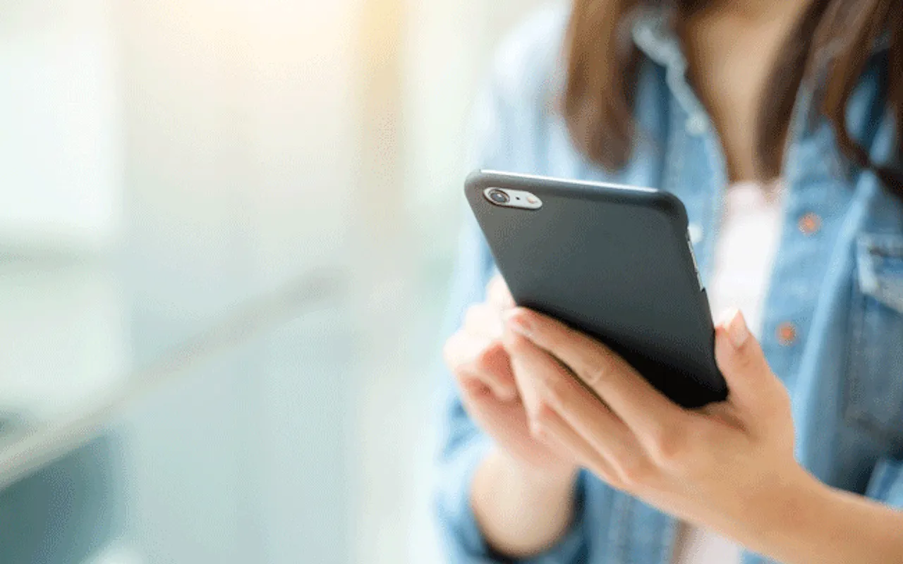 Woman using mobile phone