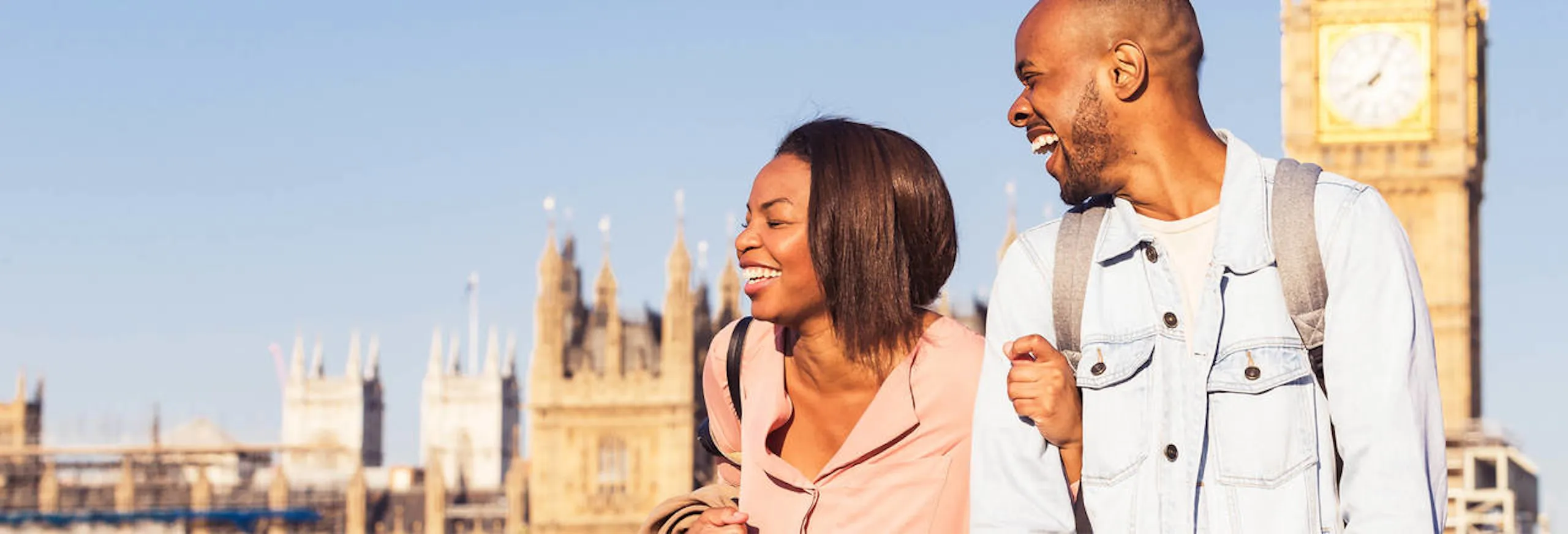 Couple walking by London Big Ben