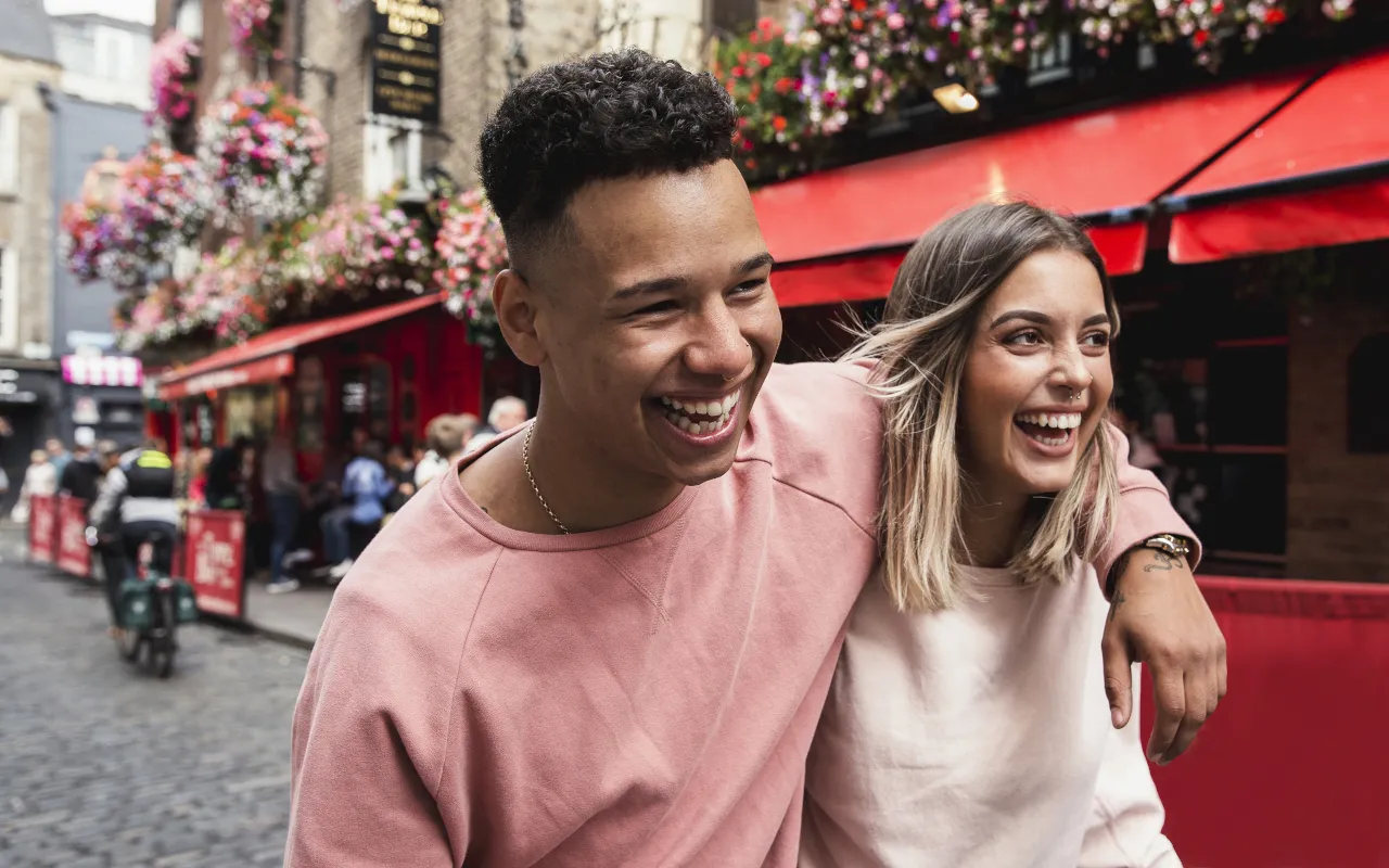 Young couple walking around in the summer time