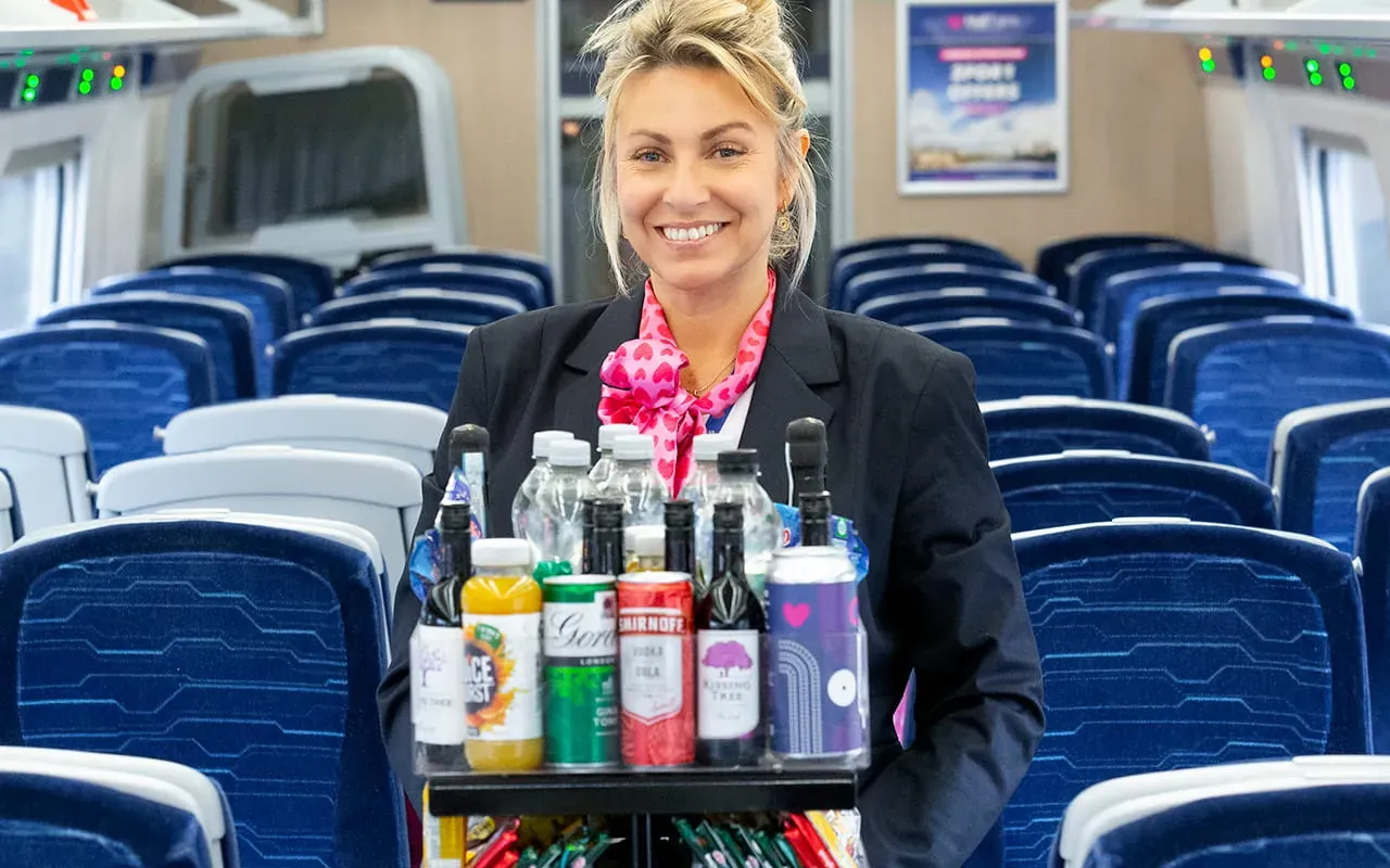 Onboard Host with standard class trolley